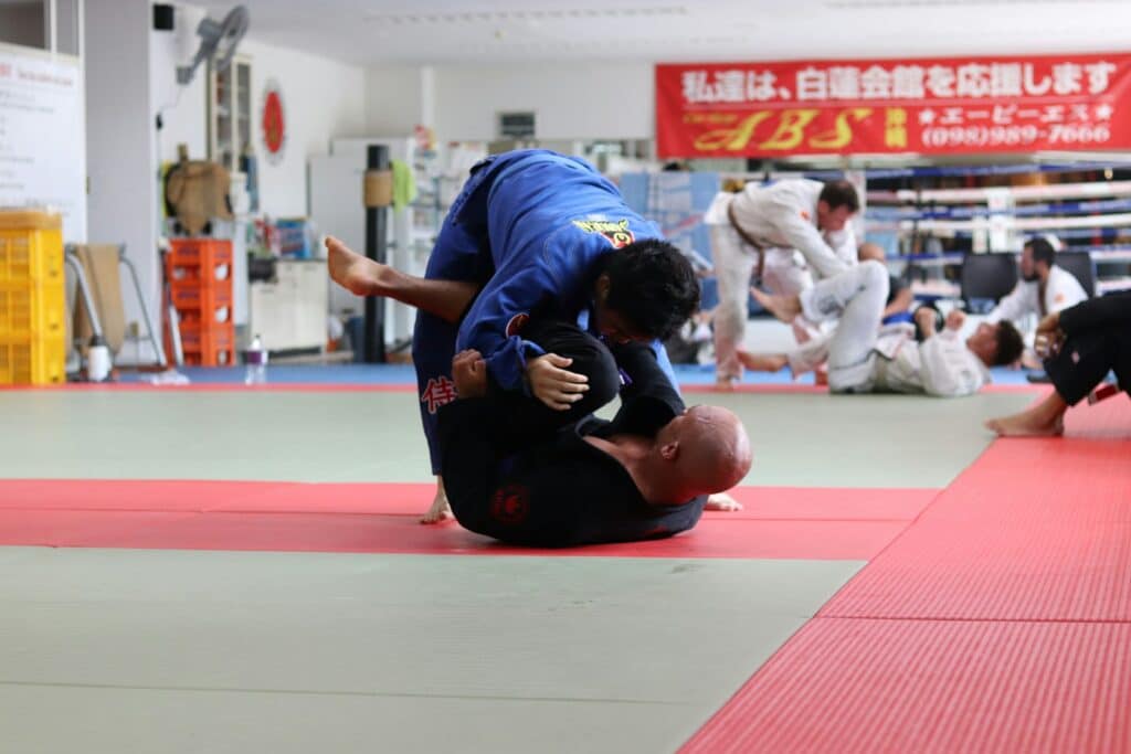 two men dueling inside room